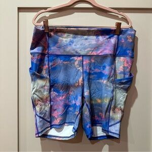 Fabletics PureLuxe Oasis High-Waisted Blue and Pink Bike Shorts